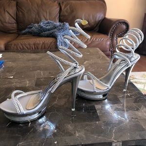 Gorgeous silver heels with wrapping around the leg